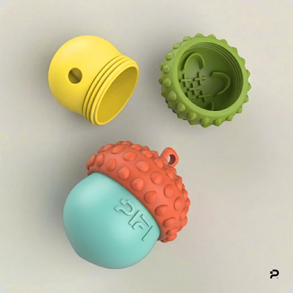 MyPiFi DentalFlex orange and green treat-dispensing dog toy shown disassembled with all three components displayed.