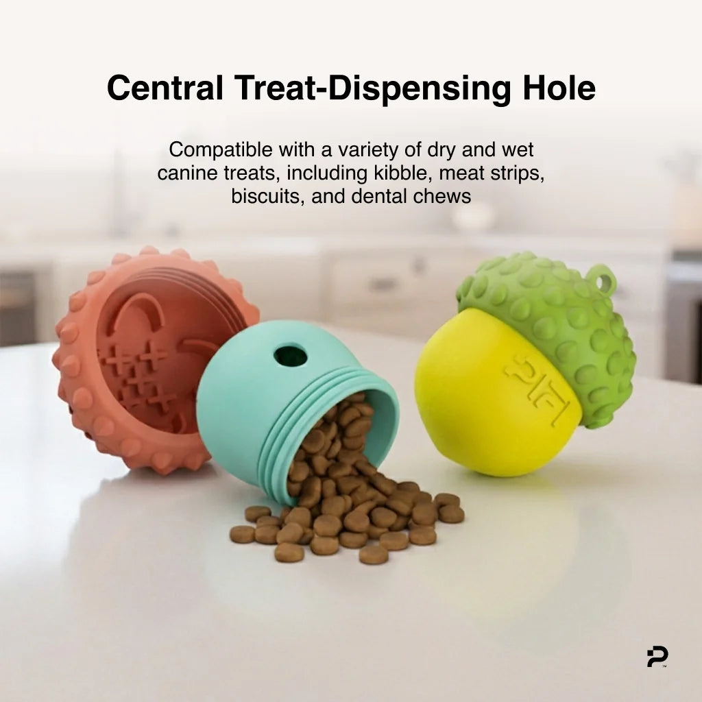 MyPiFi DentalFlex Christmas-themed orange and turquoise treat-dispensing dog toy with kibble pouring out, shown alongside the green and yellow variant on a kitchen counter.