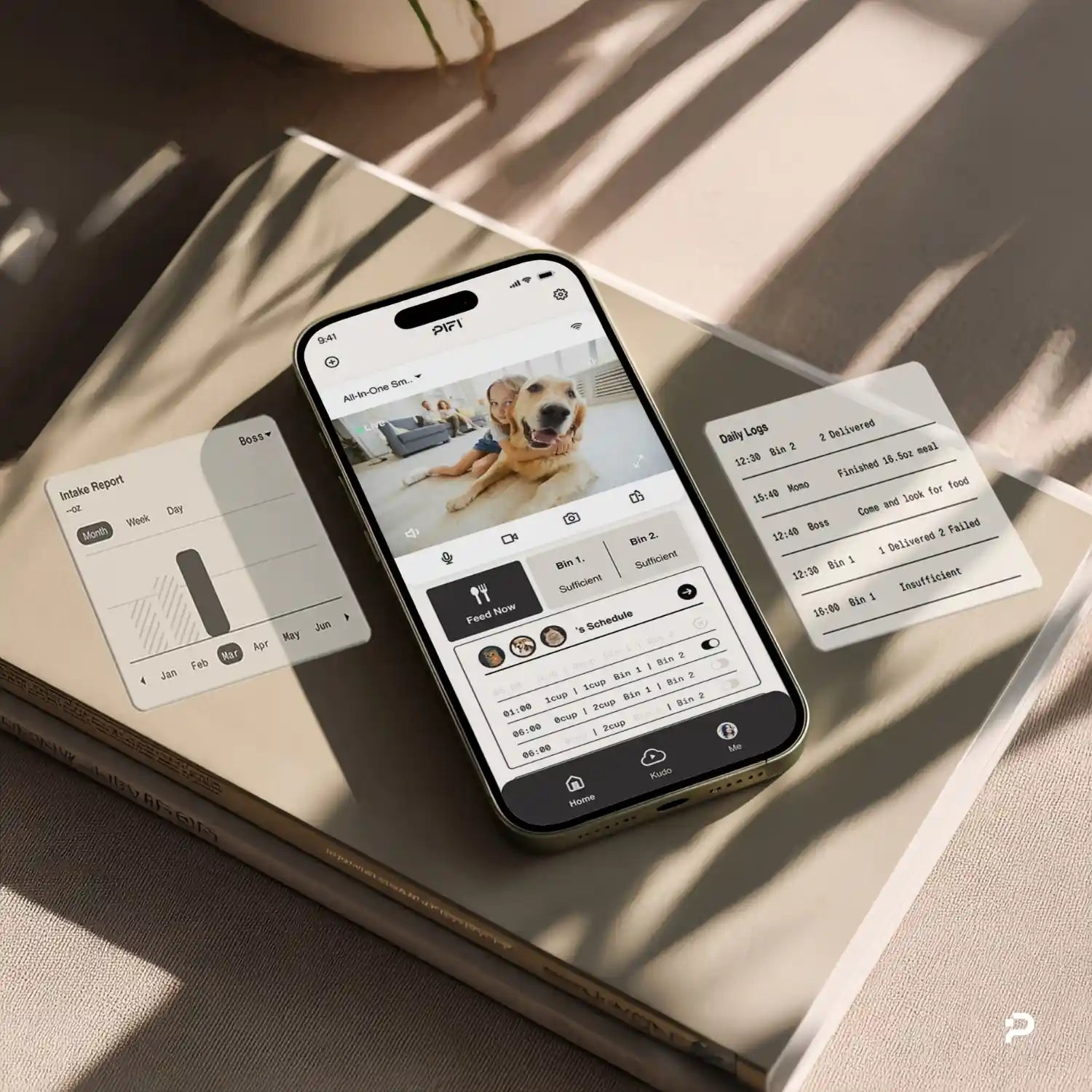 A smartphone displaying a pet monitoring app with a dog's photo sits on a closed book, surrounded by two data cards showing health and activity stats—a perfect setup for tracking pet wellness with your smart pet feeder, all on a sunlit beige surface.